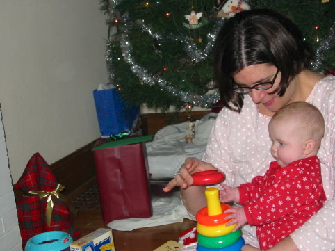Santa brought Jane a classic ring stacking toy...